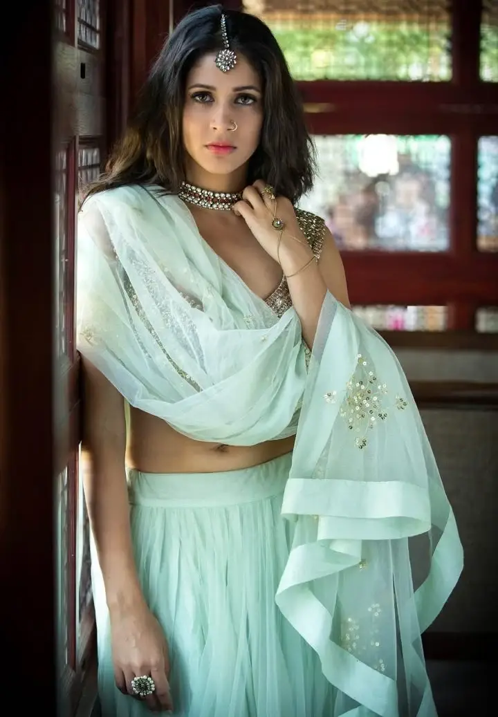 LAVANYA TRIPATHI STILLS IN GREEN LEHENGA CHOLI